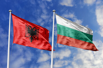 3d illustration. Albania and Bulgaria Flag waving in sky. High detailed waving flag. 3D render....