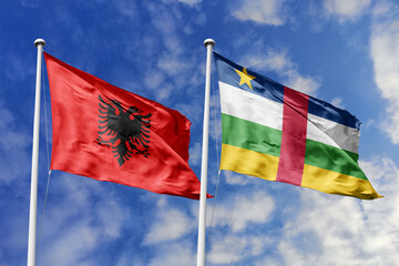 3d illustration. Albania and Central African Republic Flag waving in sky. High detailed waving flag. 3D render. Waving in sky. Flags fluttered in the cloudy sky.