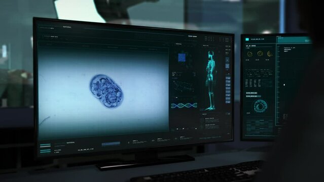 Microscopic Cell Mitosis Research During Microbiological Science Study. Mitosis Analysis Study At A Futuristic Science Laboratory Interface. Mitosis Examination During Biotechnology Science Study.