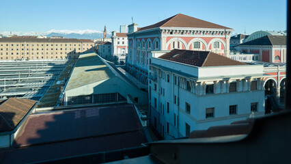 Views of the city of Turin surrounded by snow-capped mountains