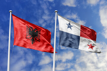 3d illustration. Albania and Panama Flag waving in sky. High detailed waving flag. 3D render. Waving in sky. Flags fluttered in the cloudy sky.