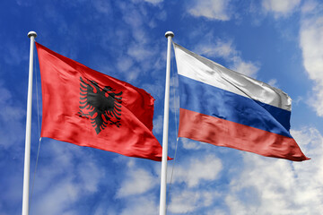 3d illustration. Albania and Russia Flag waving in sky. High detailed waving flag. 3D render. Waving in sky. Flags fluttered in the cloudy sky.