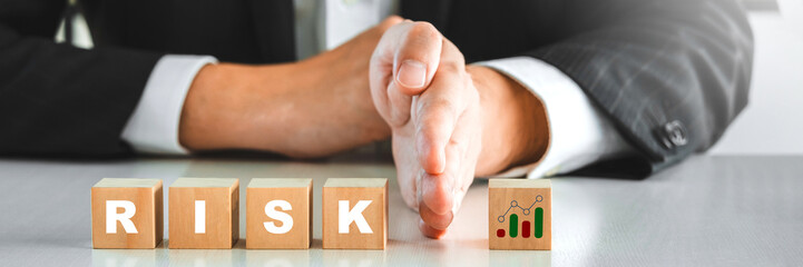 Businessman stops financial risk in business crisis management