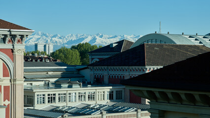 Views of the city of Turin surrounded by snow-capped mountains