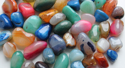 Pattern of glance multi-colored quartz stones closeup top view. Stock photo for stones backgrounds 