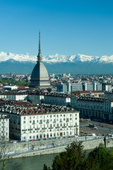 Views of the city of Turin surrounded by snow-capped mountains