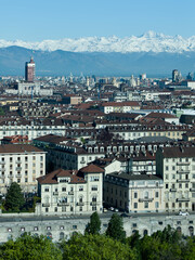 Views of the city of Turin surrounded by snow-capped mountains