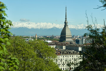 Views of the city of Turin surrounded by snow-capped mountains