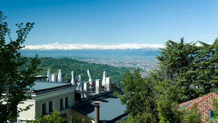 Views of the city of Turin surrounded by snow-capped mountains