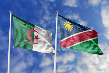 3d illustration. Algeria and Namibia Flag waving in sky. High detailed waving flag. 3D render. Waving in sky. Flags fluttered in the cloudy sky.