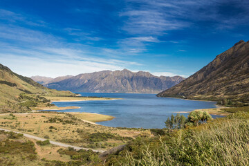 Fototapeta na wymiar Panoramic View of Lake Hawea's Turquoise Waters - Expansive Beauty in New Zealand's Landscape