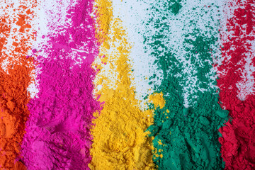 Colorful holi powder isolated on white background.