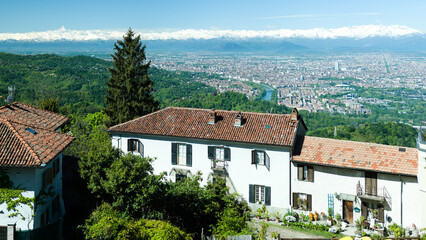 Views of the city of Turin surrounded by snow-capped mountains