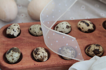 Easter table. Quail eggs. Close-up. Selective focus. Copyspace