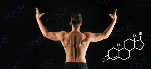 Sporty man on dark background, back view
