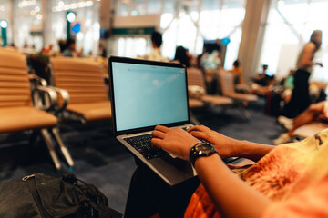 Using a laptop at the airport