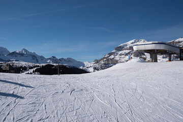 Mountain Ski Lift and Italian Dolomites Mountains, Snow covered Ski Slope, Italy