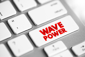 Wave Power is the capture of energy of wind waves to do electricity generation, water desalination, or pumping water, text concept button on keyboard