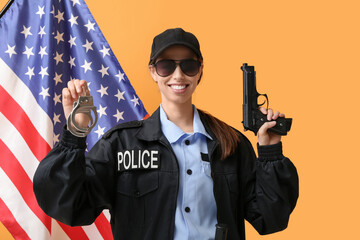 Female police officer with gun and handcuffs against yellow background with USA flag