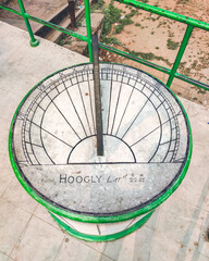 Old concrete sundial in Hoogly, West Bengal, India in January 2023....