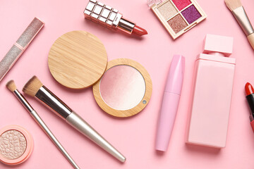 Set of decorative cosmetics on pink background. Top view