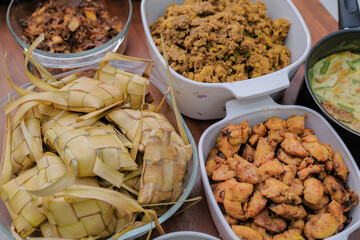 Ketupat typical Hari Raya, served with Rendang, Lodeh, and Sambal Goreng . Special dishes during Eid al-Fitr, especially in Malaysia
