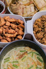 Ketupat typical Hari Raya, served with Rendang, Lodeh, and Sambal Goreng . Special dishes during Eid al-Fitr, especially in Malaysia