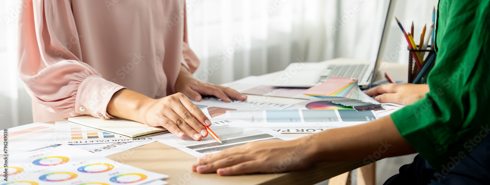 Poster cropped image of professional interior designers discuss and brainstorm main theme color in project 