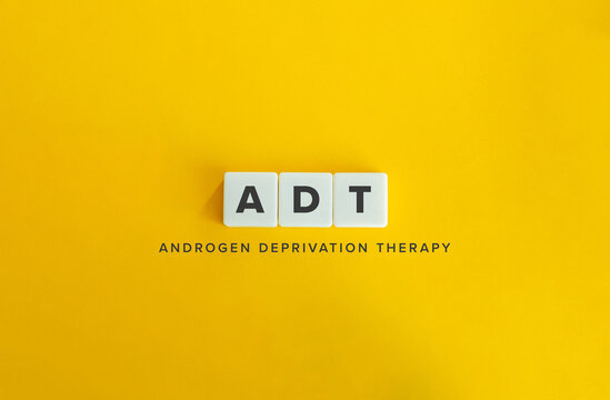 Androgen Deprivation Therapy (ADT) Banner. Acronym and Text on Block Letter Tiles on Flat Background. Minimalist Aesthetics.