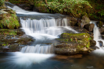 Waterfalls in the Pisueña River in the Valles pasiegos of Cantabria