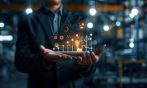 A businessman shows a productivity icon that is connected to a growth chart. This visual element symbolizes the focus on increasing efficiency and effectiveness in industrial management.