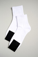 Mens new socks on a gray background, close-up. Cotton socks with blank label - 796280230