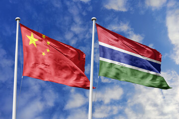 3d illustration. China and Gambia Flag waving in sky. High detailed waving flag. 3D render. Waving...