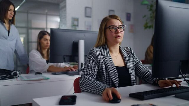 Diverse Women Working In Office Of Modern Web-Design And Marketing Research Company