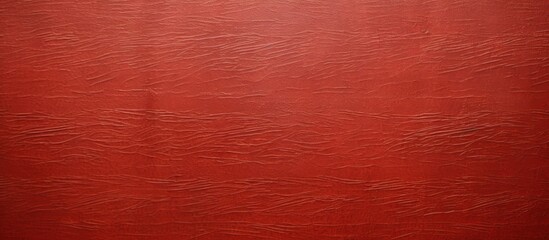 Fototapeta premium A vibrant red wall displaying a wavy line pattern