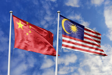 3d illustration. China and Malaysia Flag waving in sky. High detailed waving flag. 3D render. Waving in sky. Flags fluttered in the cloudy sky.