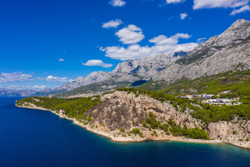 Aerial drone view . Beautiful coastline, clear sea from a bird's eye view of Dalmatia, Croatia. Makarska Riviera, famous and tourist place in Europe