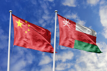 3d illustration. China and Oman Flag waving in sky. High detailed waving flag. 3D render. Waving in...