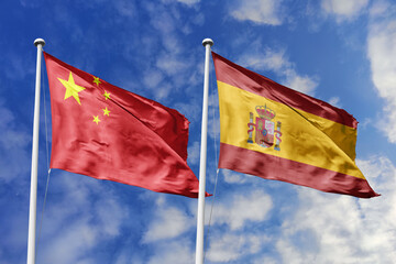 3d illustration. China and Spain Flag waving in sky. High detailed waving flag. 3D render. Waving...