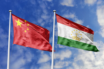 3d illustration. China and Tajikistan Flag waving in sky. High detailed waving flag. 3D render. Waving in sky. Flags fluttered in the cloudy sky.