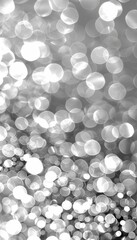 Abstract grey light bokeh background in defocused blurry style for modern design