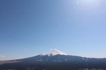 Mount Fuji with sunny blue sky and lake in Japan