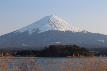 Mount Fuji with sunny blue sky and lake in Japan