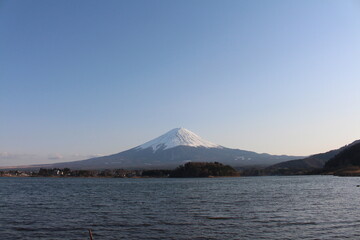 Mount Fuji with sunny blue sky and lake in Japan