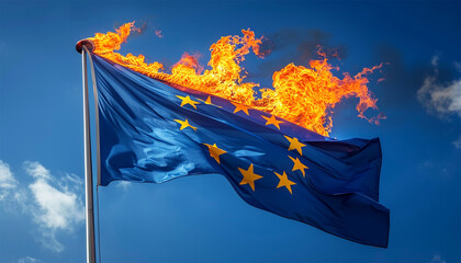 Flag of European Union on fire burning. The European Union suffers from a crisis, visualized by the European flag. Concept of crisis and war. Conflict