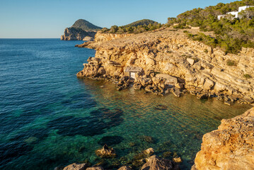 Punta Galera cove fishing huts, near Sant Antoni de Portmany, Ibiza, Balearic Islands, Spain