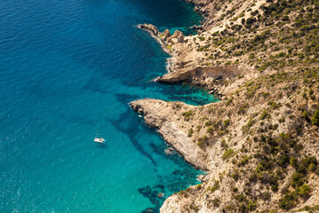 Aerial view of Atlantis natural pools and the small coves with turquoise waters in the coastline, Sant Josep de Sa Talaia, Ibiza, Balearic Islands, Spain