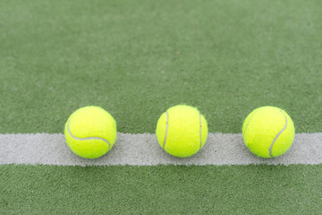 close up of a padel and tennis court with artificial grass and balls - 796318058