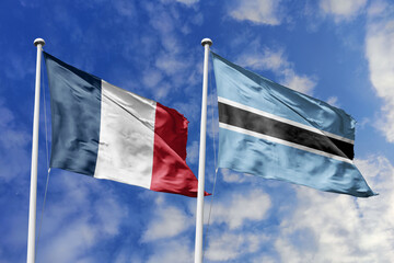 3d illustration. France and Botswana Flag waving in sky. High detailed waving flag. 3D render....