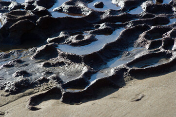 texture and Rocks and sea landscape along the shore at  La Pelosa, Stintino, Sassari, Sardegna, Italia